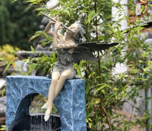 Design Toscano Fairy of the West Wind Sitting Sculpture